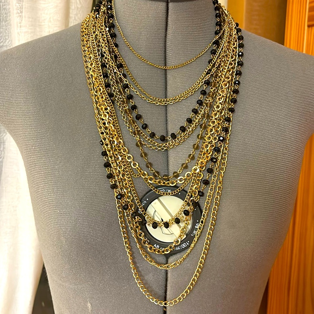 Gold and black necklace